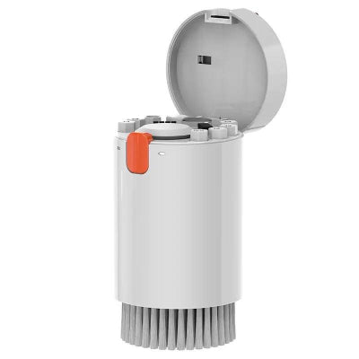 Laptop keyboard cleaner kit with detachable brush and storage compartment.