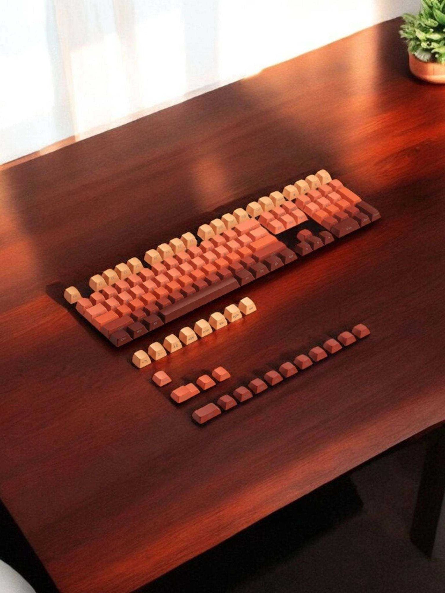 Gradient Keycaps for RGB mechanical keyboard with vibrant purple, red, and orange hues on a wooden desk.